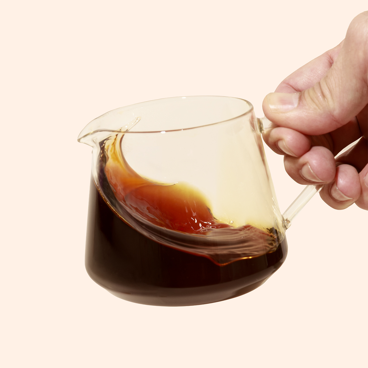 Coffee wave poured into a glass carafe